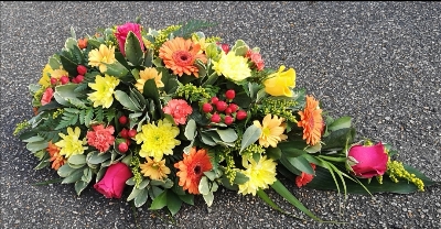funeral flowers, spray, oasis, orange, yellow, red  colourful, harold wood florist, delivery, romford 