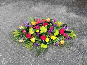 coffin, spray. casket, tribute, flowers, funeral, Caribbean, bright, funky,  divine, deluxe, florist, harold wood, romford, havering, delivery