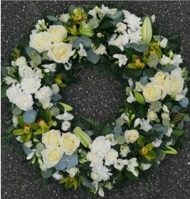 wreath, circle, orchid, white, oasis, funeral, tribute,oasis, man, woman, male, female, flowers, harold wood, romford, havering, florist, delivery
