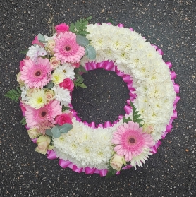 based, pink, white, funeral, circle, wreath,  tribute,  flower , design,  roses, gerberas harold wood romford florist havering,brenwood, dagenham delivery