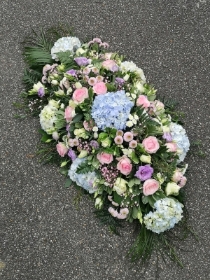 casket, coffin, spray, hydrangea, pinks, pastels, blue, white, male, female, funeral, tribute, flowers, oasis, harold wood, romford, havering, delivery